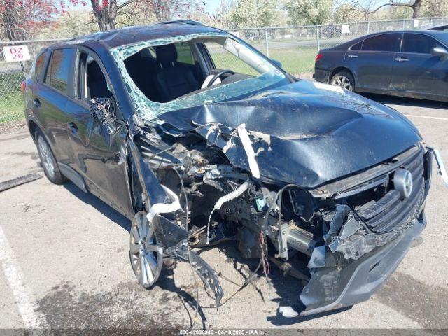 Salvage Mazda Cx