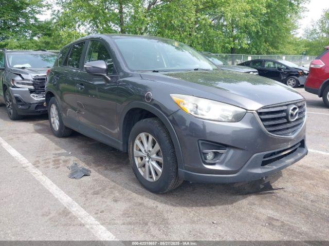  Salvage Mazda Cx