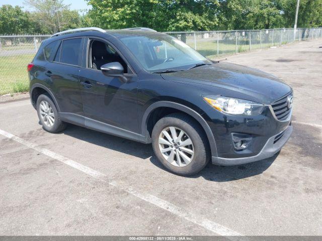  Salvage Mazda Cx